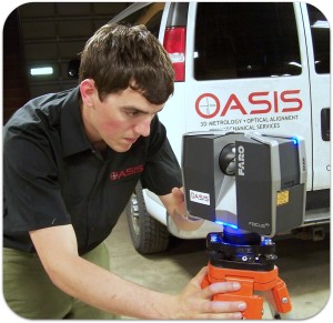 OASIS Metrology Engineer with laser scanner.