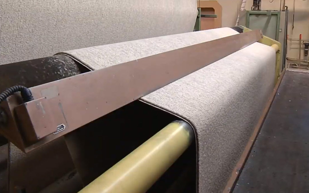 Carpet Manufacturer Sees Impressive Results from Precision Alignment of Plastic Coating Line