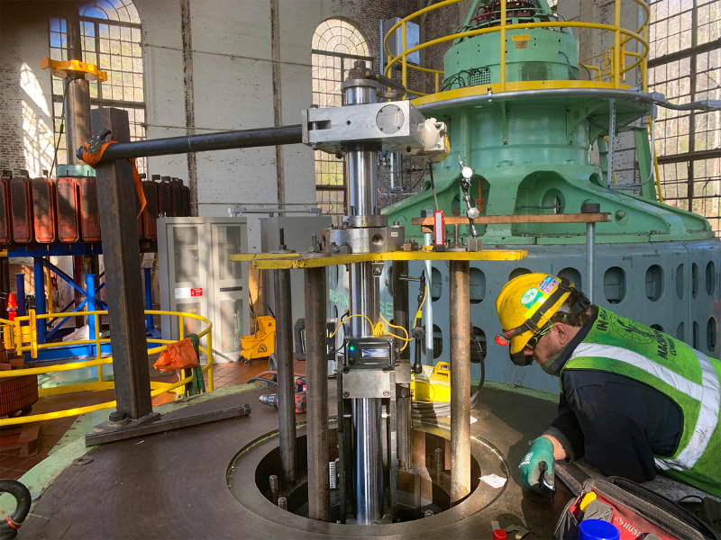Hydro turbine shaft repair on-site without shaft rotation (utilizing custom tooling rings)